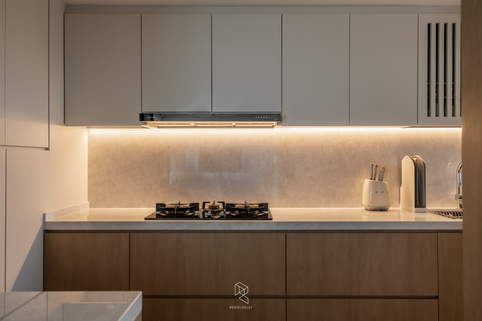 Modern Scandinavian kitchen with woodgrain lower cabinets, light grey upper cabinets, stone-look countertop, fluted glass door, and built-in oven.