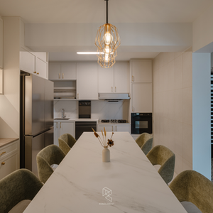 Modern Contemporary kitchen design with a large island, shaker cabinets, marble-inspired countertops, brushed brass accents, and practical storage solutions.