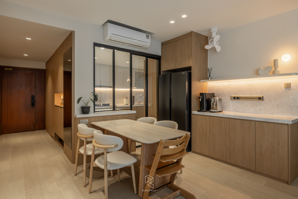 Modern Scandinavian dining room with wood dining table, built-in sideboard, concealed storage, and warm wood cabinetry in a resale condo.