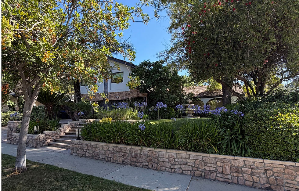 A home on a Tree-lined residential street in the San Fernando Valley during the fall home buying season in Los Angeles