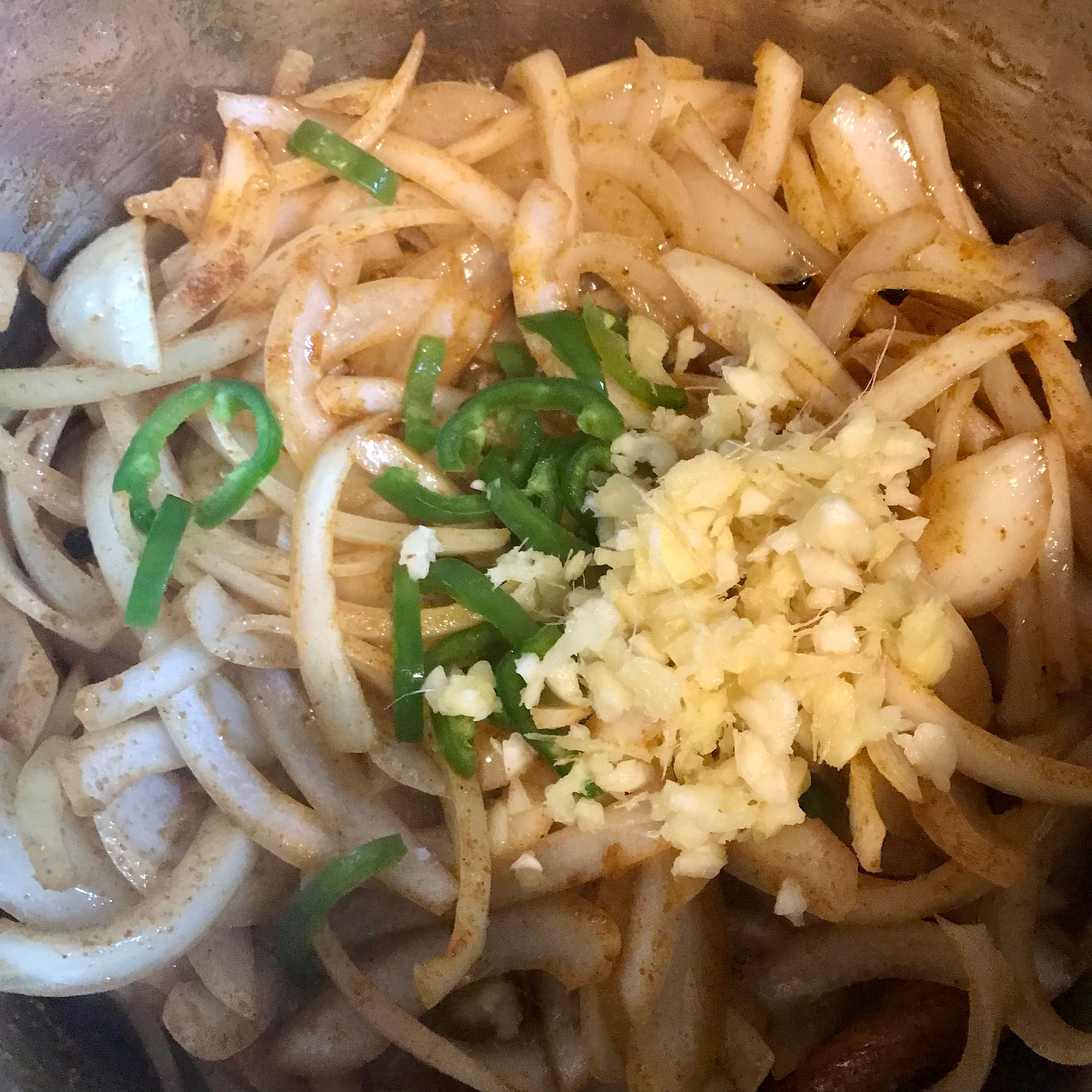 Add the green chilli, garlic and ginger