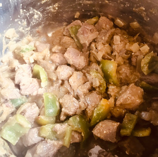 Thai green curry - in this case beef; brown the beef with the wet curry paste