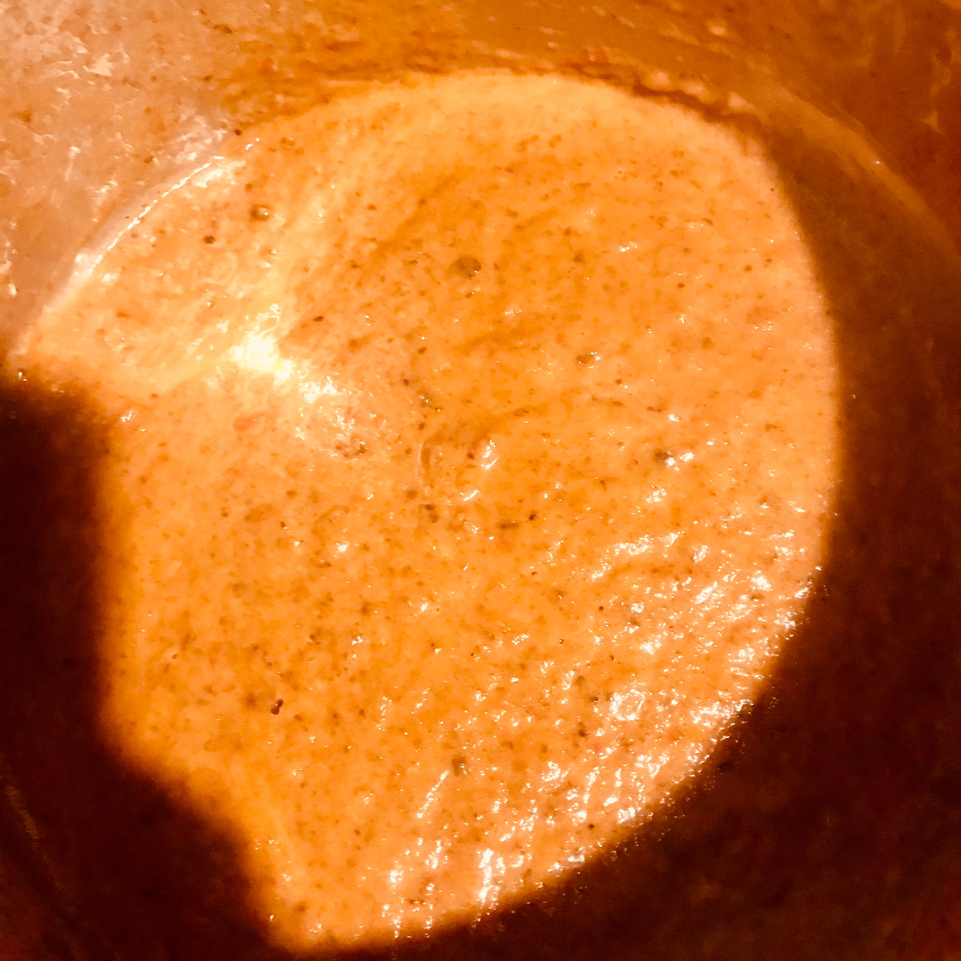 Blend the reduced ingredients in the pot using a handheld blender