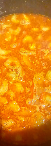 Add the boiling water, cover and simmer vigorously