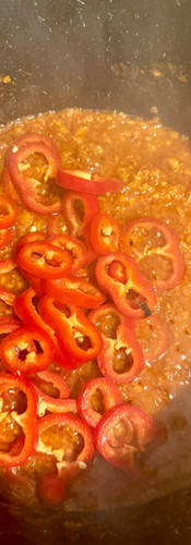 Add the sweeet peppers and sauté until they start to soften