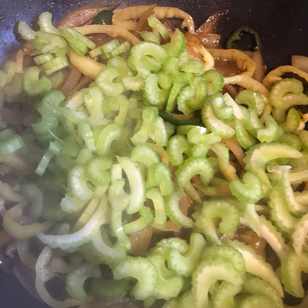 Add the celery once the bell peppers have softened