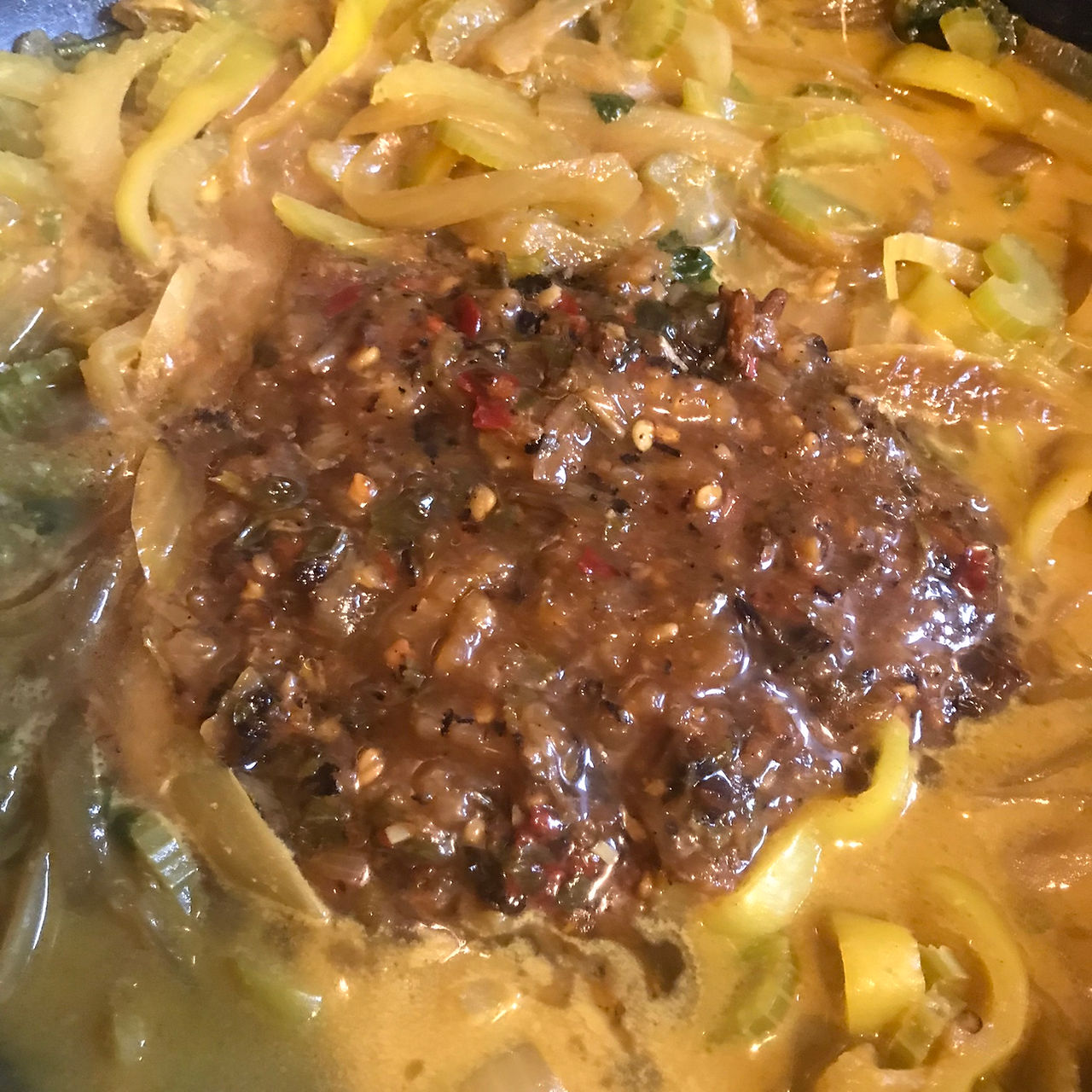 Add the sauce made from the marinade back into the pot
