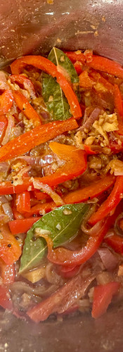Cook the ingredients in the watered spice mix