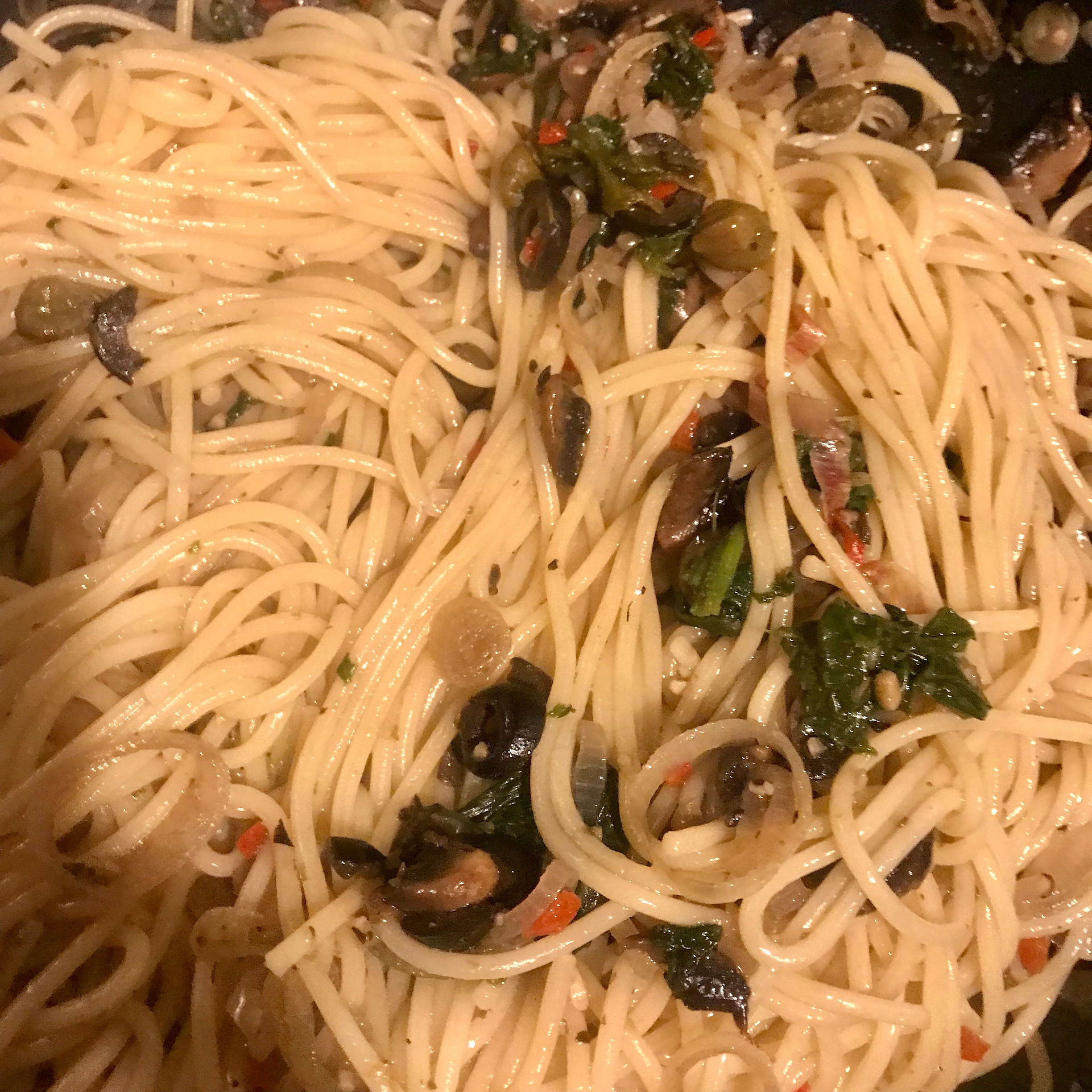 Add the drained pasta to the pan and add the extra virgin olive oil