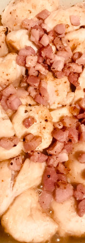 Add the pancetta back into the pan and sauté with the sealed chicken in cognac