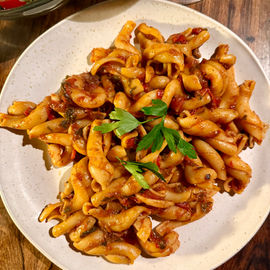 Sicilian casarecce with caper and anchovy tomato sauce