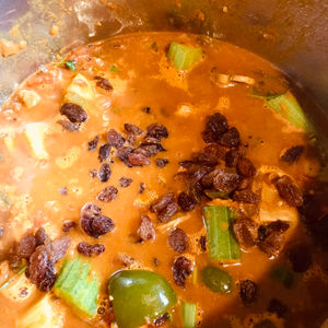 Add the raisins and celery once the tomatoes reduc