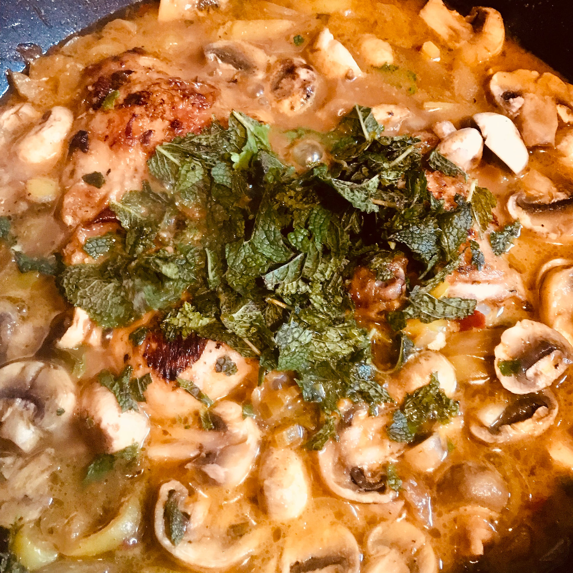 When the mushrooms are half-cooked, add the chopped mint