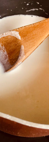 Bring the cream to a gentle simmer