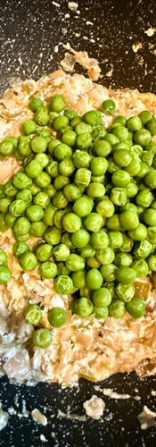 Add the peas and fold in