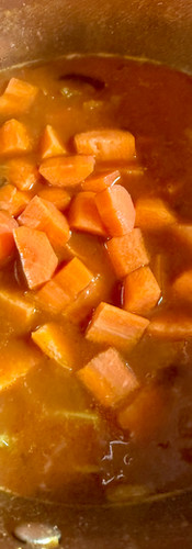Add the carrots and push down into the liquid