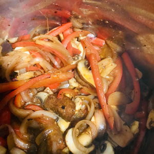 Sweat the onions, bell peppers and mushrooms together for a further 5 to 6mins.