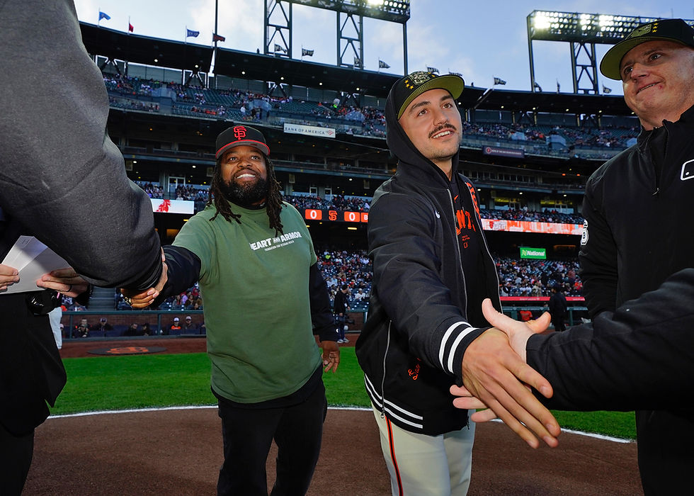 Aundray T. Rogers playing Captain at San Francisco Giants Baseball game.