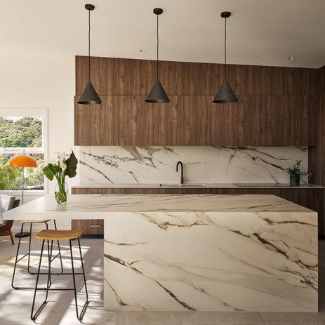 Natiao Walnut Woomatt finish doors by Polytec and Porcelain benchtop by GB Interiors, leading joinery and kitchen company in Sydney