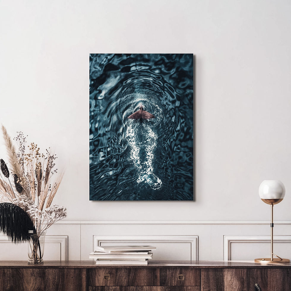 Thumbnail: Print of a sperm whale tail, hung above a side table