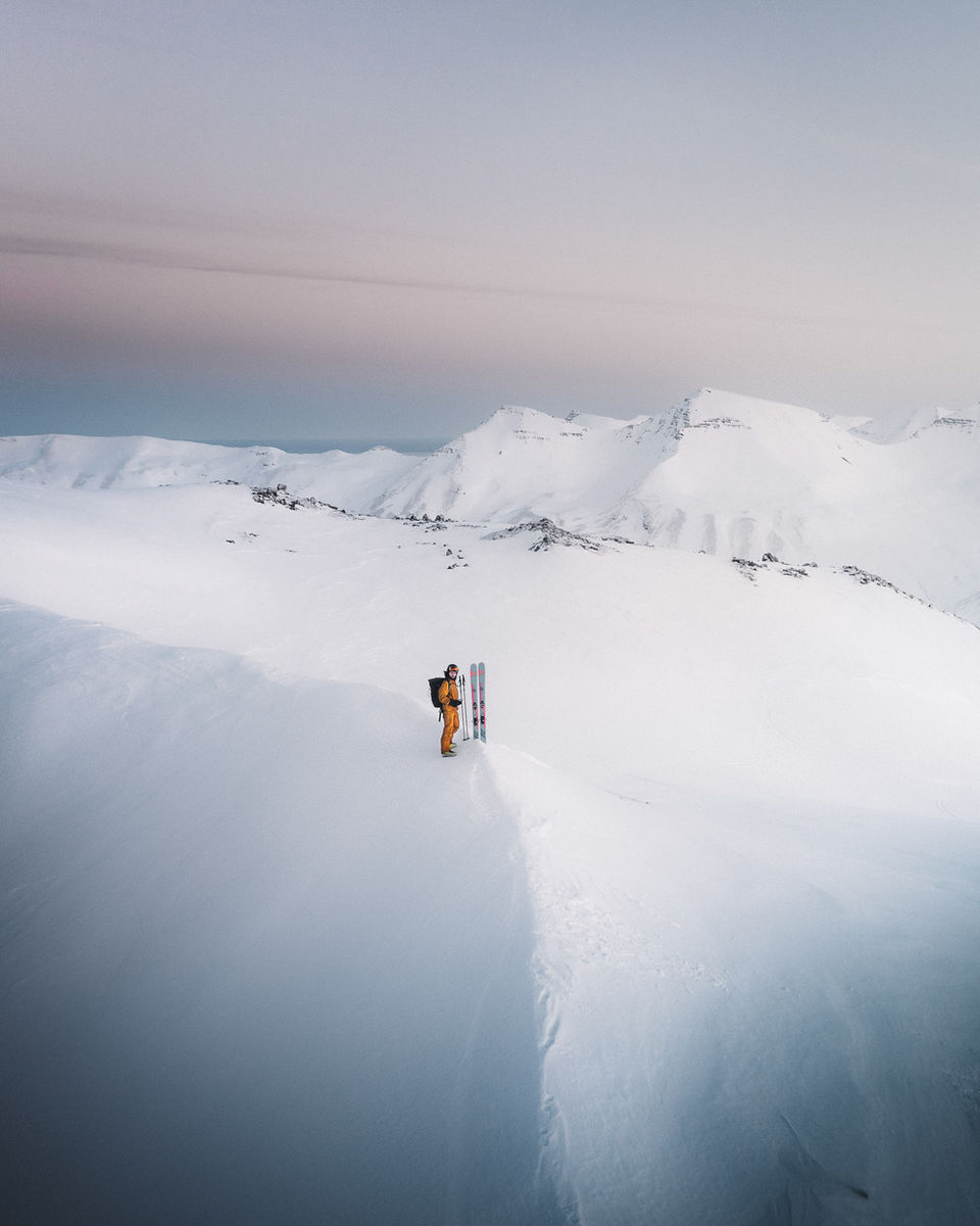 Skier on mountain peak