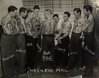 A gathering of tattooed men at the first tattoo 'convention'