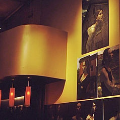 Claude Marquis with Worriers series portraits at Mercury Lounge bar Ottawa November 1996