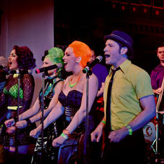Album launch live concert photo of The PepTides, documented by Claude Marquis, showing the band performing on stage at St. Alban’s Church in Ottawa during the album release show.