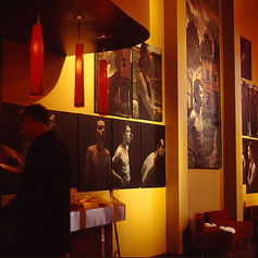 Claude Marquis with Worriers series portraits at Mercury Lounge bar Ottawa November 1996