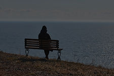 single-girl-in-a-black-jacket-and-hat-sitting-on-b-2025-03-18-01-29-34-utc_edited.jpg