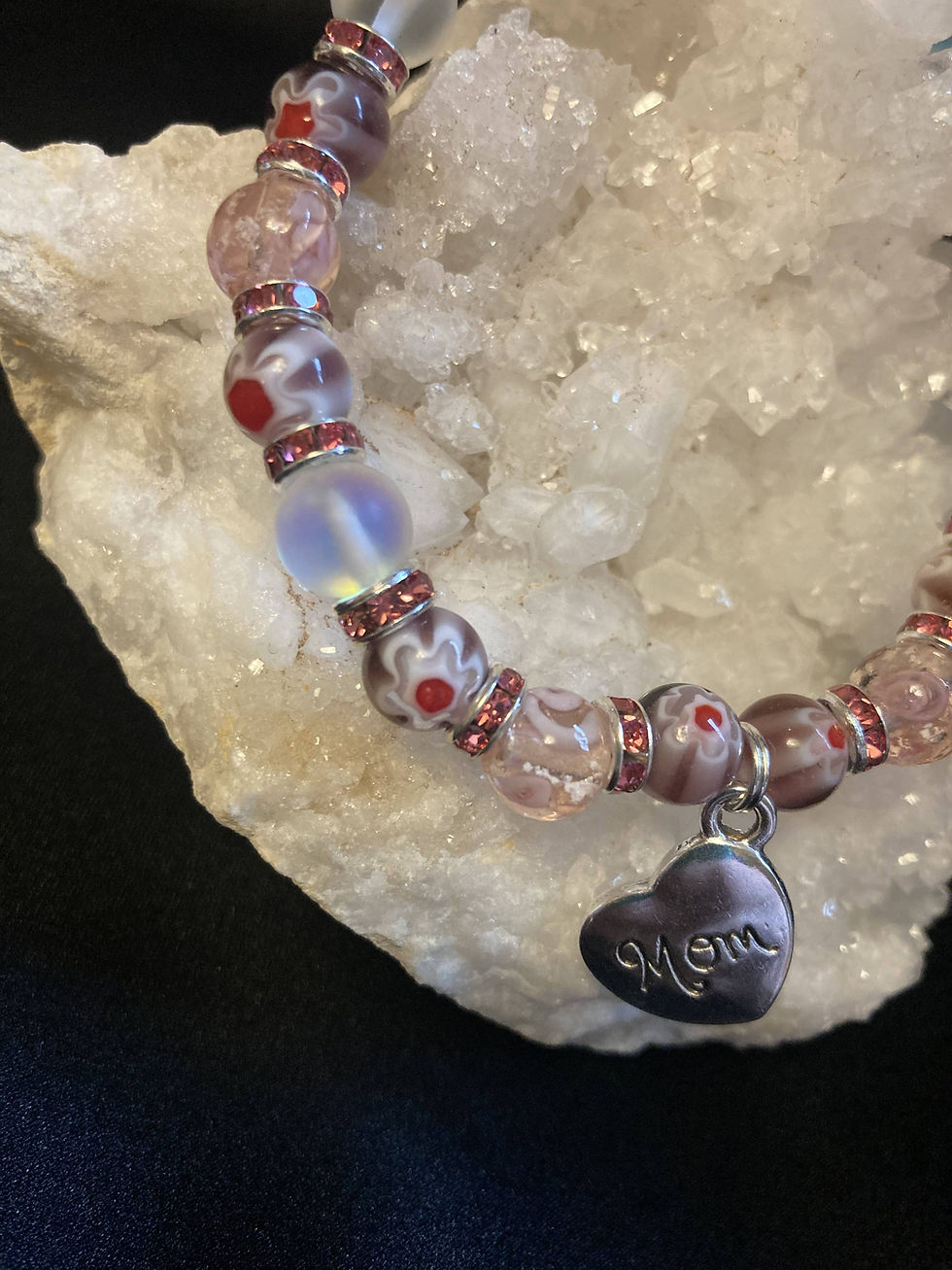 Thumbnail: Picture of red and pink Mother's day bracelet
