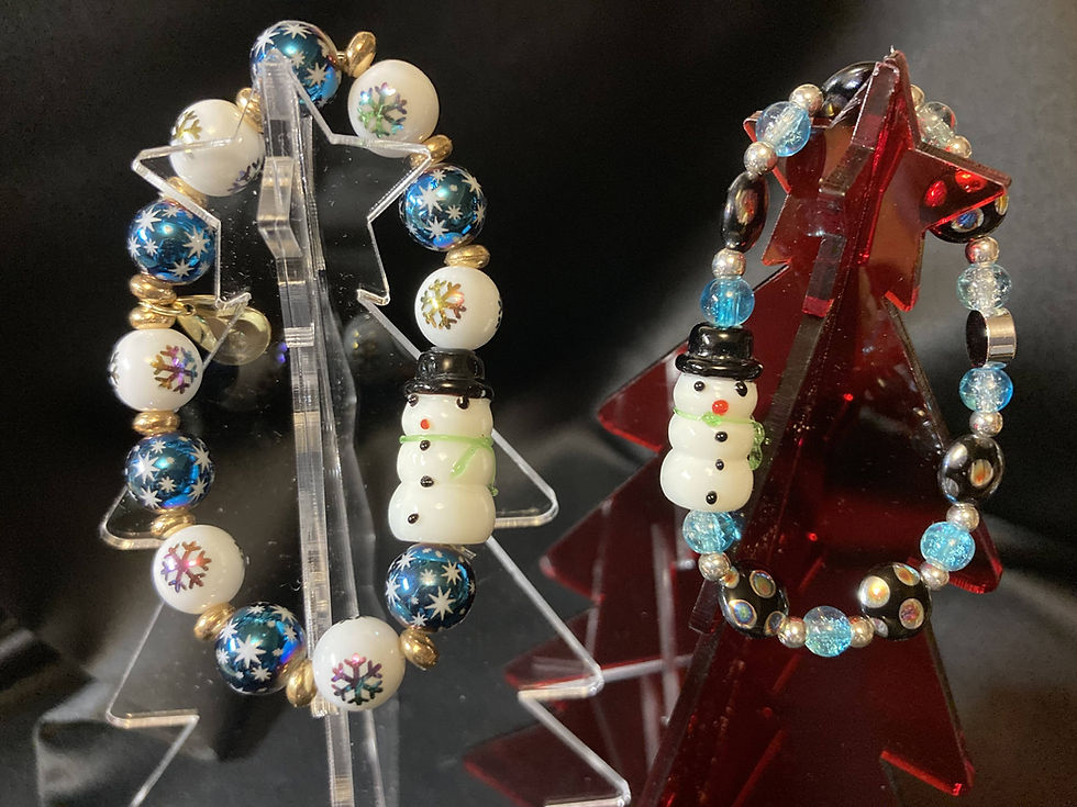 Thumbnail: Glass bracelets with snowman beads