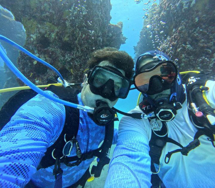 Veterans diving as part of the Military Recreational Divers program, capturing the therapeutic benefits of scuba diving. Photographed by a Fort Lauderdale photographer