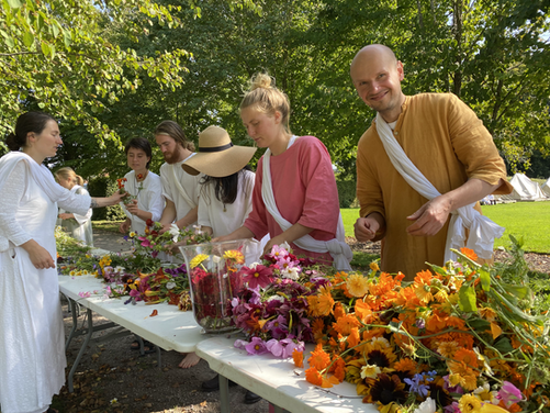 community prepares flower bouquets