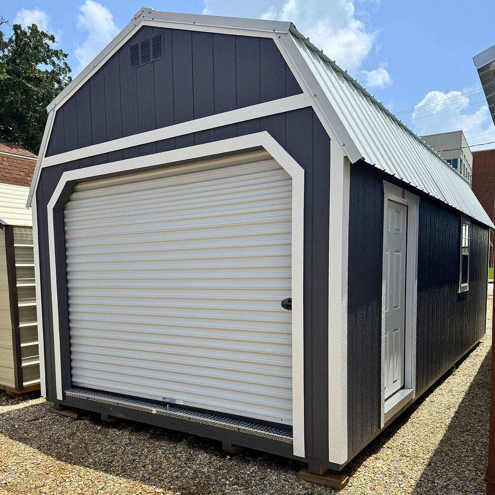 Derksen Lofted Barn Garage 12x24 with roll-up and walk-in doors.