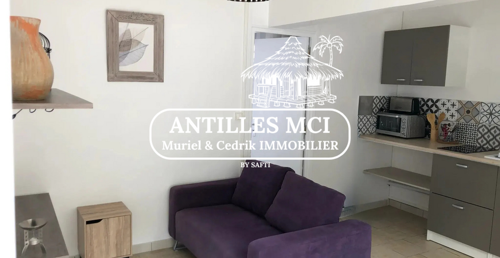 Séjour lumineux avec cuisine ouverte – immeuble Sainte-Anne – Antilles MCI