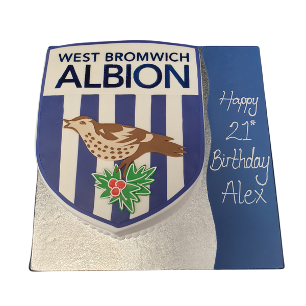 A decorative football-themed cake featuring the iconic West Bromwich Albion Football Club badge. Perfect for fans and celebrations.