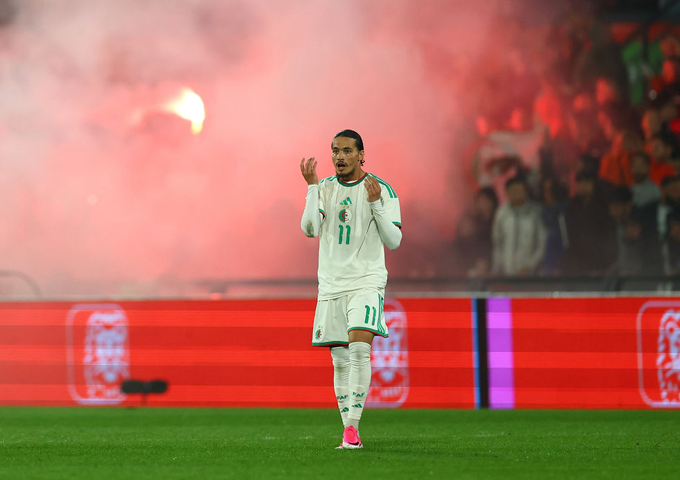 SOCCER: Algeria score late to upset Dutch with surprise away win