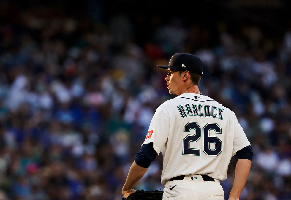 BASEBALL: After late rally, Royals bid for rare road sweep of Mariners