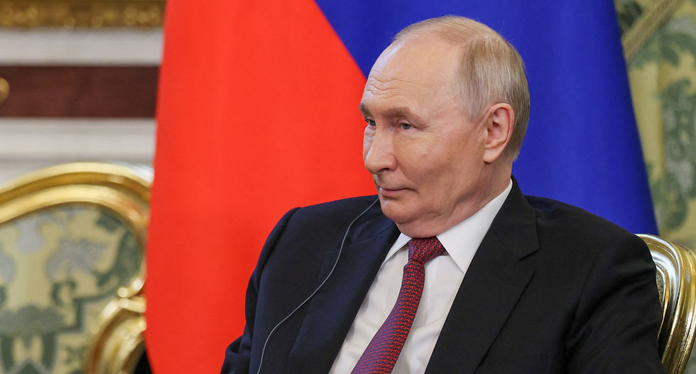 Putin faces rival visions of war and peace at Russia's 'Davos'