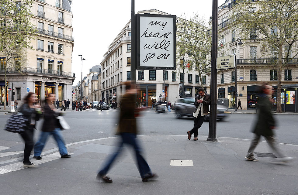 Posters of Celine Dion songs in Paris stir hopes of comeback concert