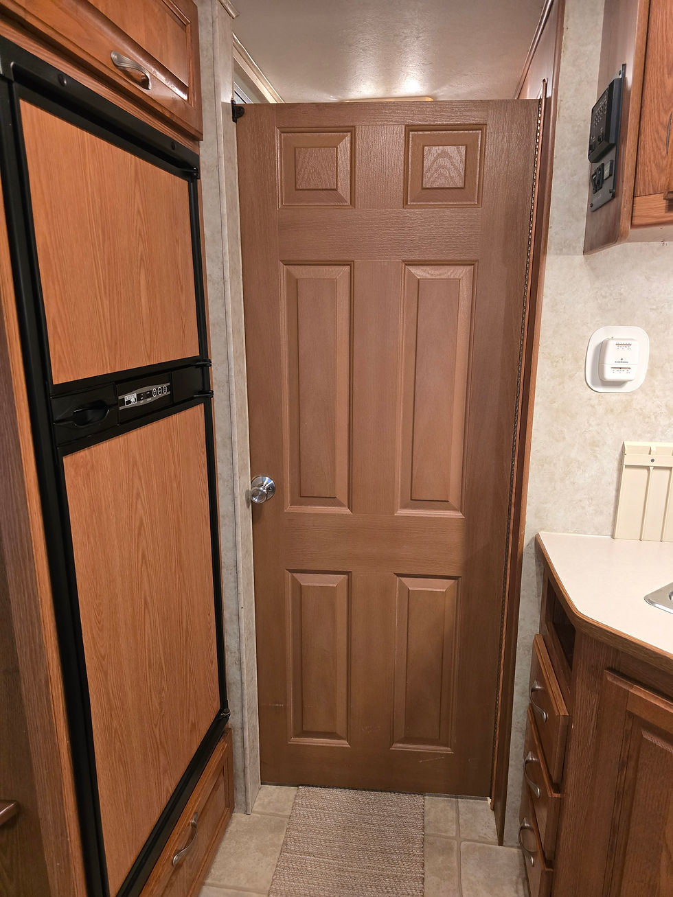 Door to bath and bedroom