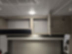 Cupboard above booth
