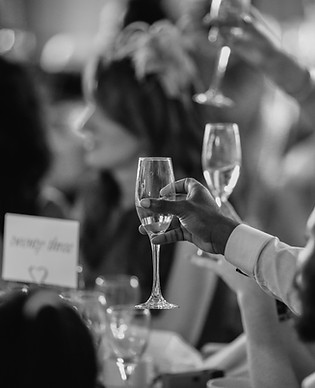 guests toasting champagne
