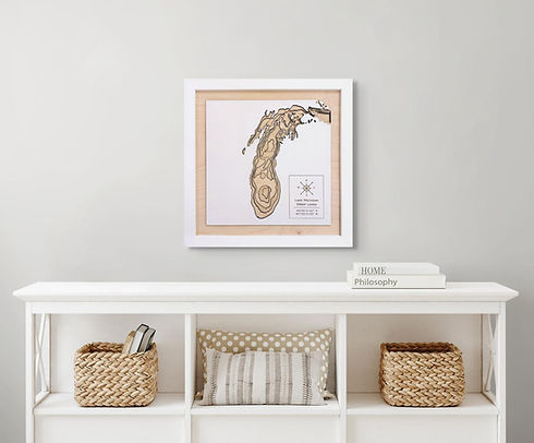 minimalist 3D architectural wood lake map in a clean natural birch finish, displayed in a modern interior setting over a sleek white console table.