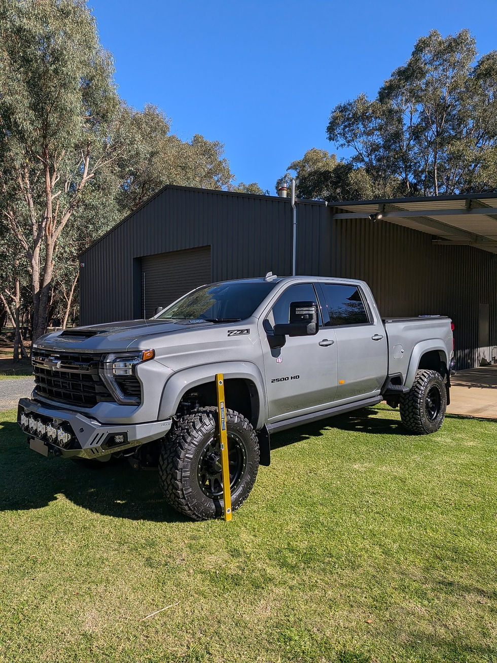 chevrolet silverado 2500 undergoing an inspection