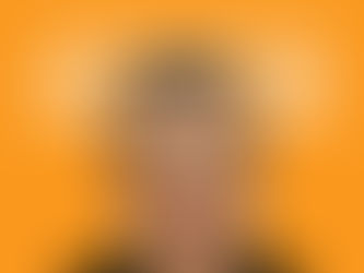 Host Ali Horriyat centered in front of engaging orange background and the white letters: Compassiviste Dialogues