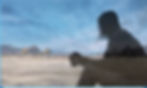 Person with coffee looking at mtns._edited.jpg