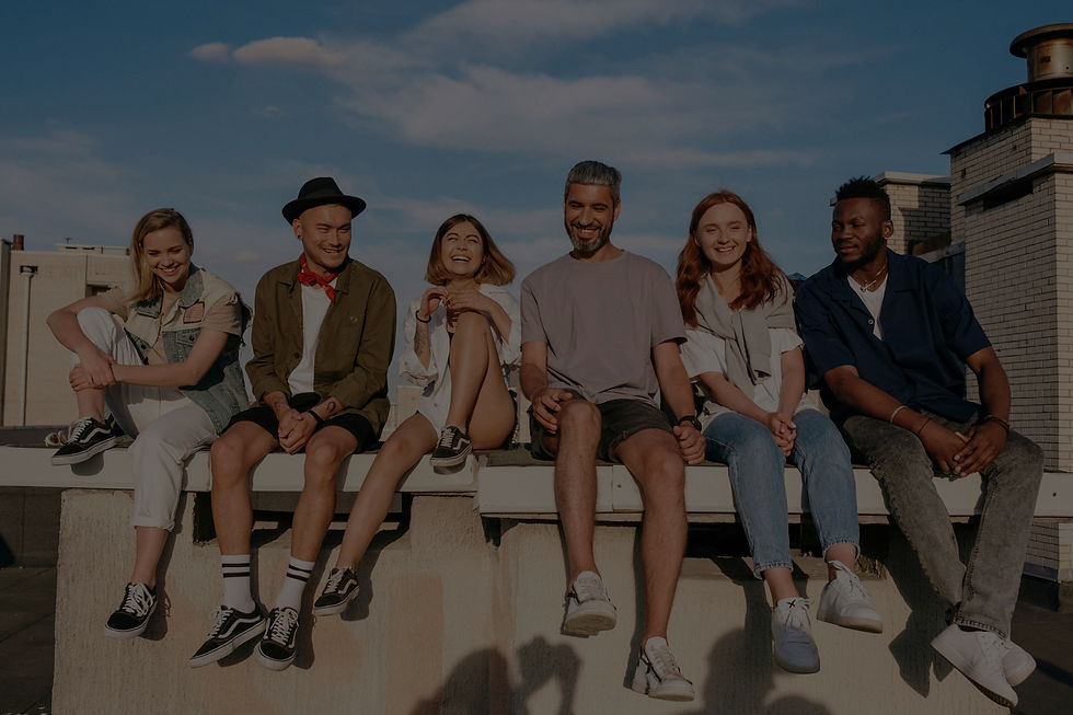 a happy group of individuals sitting
