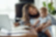 Mother and baby learning about developmental support online